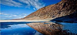 reflection of rock on lakeshore